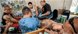  ?? ABIGAIL DOUGHERTY / STUFF ?? Oscar Kightley says the support of his friends has helped him endure the ordeal of his tatau – and to never let his thoughts reach the point where he wanted to quit.