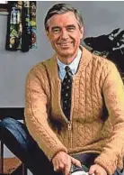  ?? ASSOCIATED PRESS ?? Fred Rogers poses on the Pittsburgh set of his television show "Mister Rogers' Neighborho­od" in 1996.