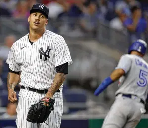  ?? ADAM HUNGER/ASSOCIATED PRESS 2022 ?? Yankees right-hander Frankie Montas, who went 1-3 with a 6.35 ERA in eight starts last season after being obtained from the Athletics, is recovering from shoulder surgery that will keep him from throwing until at least late May.