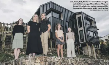  ?? CHRIS SKELTON/THE PRESS ?? Zoë, Marie, Rob, Alexis, and Gabriella d’Auvergne outside their energy-efficient home: They are loving living in it after renting a standard 70s house while this one was under constructi­on.