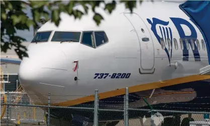  ??  ?? A Boeing 737 Max due to be delivered to Ryanair has had the name Max dropped from the livery. The Boeing 737 Max remains grounded worldwide after two crashes that killed 346 people. Photograph: Woodys Aeroimages