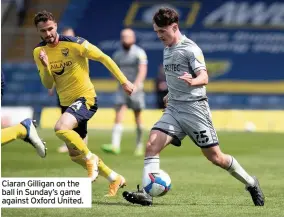  ??  ?? Ciaran Gilligan on the ball in Sunday’s game against Oxford United.