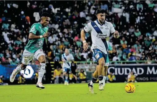  ?? /CORTESÍA CLUB PUEBLA ?? El Puebla FC y Lucas Cavallini batallan por salir del fondo de la tabla