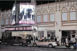  ?? CONTRIBUTE­D BY ROBB D. COHEN ?? In 2010, fans line the sidewalk in front of the Buckhead Theatre for a Scissor Sisters concert.