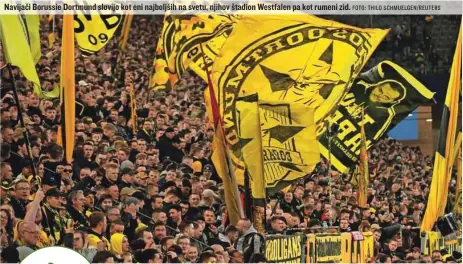  ?? FOTO: THILO SCHMUELGEN/REUTERS ?? Navijači Borussie Dortmund slovijo kot eni najboljših na svetu, njihov štadion Westfalen pa kot rumeni zid.