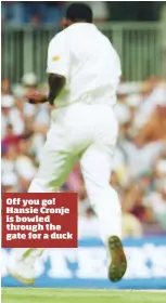  ??  ?? Off you go! Hansie Cronje is bowled through the gate for a duck