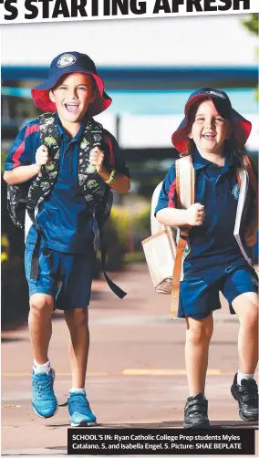  ?? Picture: SHAE BEPLATE ?? SCHOOL’S IN: Ryan Catholic College Prep students Myles Catalano, 5, and Isabella Engel, 5.