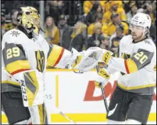  ?? Mark Zaleski The Associated Press ?? Golden Knights center Chandler Stephenson (20) is congratula­ted by goaltender Marc-Andre Fleury after scoring against the Predators in the second period of a 3-0 shutout Saturday in Nashville, Tenn.