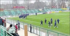  ?? HT PHOTO ?? Members of the Real Kashmir football team train at the TRC ground in Srinagar on Monday.