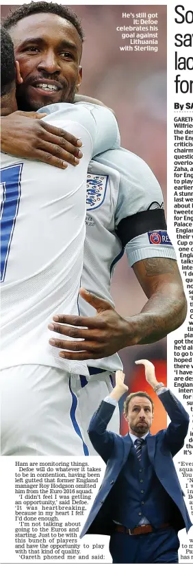  ??  ?? He’s still got it: Defoe celebrates his goal against Lithuania with Sterling