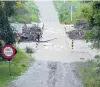  ?? PHOTO: BILL CAMPBELL ?? The Shag River in flood at Craig Rd, near Dunback, yesterday. Switchback Rd and Craig Rd — between Palmerston and Dunback — were both closed by flood waters.