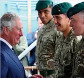  ?? ?? Honour...King Charles meets Marines in 2018