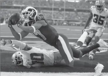  ?? BRAD LOPER, FORT WORTH STAR-TELEGRAM ?? Los Angeles Rams wide receiver Robert Woods (17) just misses a touchdown reception against the Dallas Cowboys. The Rams won, 35-30.