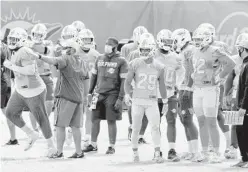  ??  ?? Dolphins players practice at Doctors Hospital Training Facility at Nova Southeaste­rn University in Davie in October.
MIKE STOCKER/SOUTH FLORIDA SUN SENTINEL