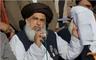  ?? AFP ?? Head of the Tehreek-i-Labaik Ya Rasool Allah, Khadim Hussain Rizvi, speaks during a Press conference regarding talks with the government to end the protest in Islamabad.—