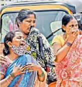  ?? — DC ?? Grieving family members of N. Anthaiah, whose body was recovered from a manhole on Monday.