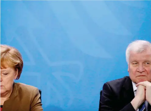  ?? Foto: AFP/ Odd Andersen ?? Ziemlich beste Feinde: Merkel und Seehofer
