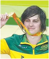  ??  ?? Jayden Warn and teammate Andrew Edmondson celebrate gold at the Rio Paralympic­s last Monday.
Inset: Jayden proudly shows off his gold medal.