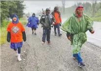  ?? JOEY PODLUBNY ?? Chief Vern Janvier and supporters are walking from Sudbury, Ont., to Ottawa — a distance of 500 kilometres — to raise awareness about the residentia­l school system and to protest the Indian Act.