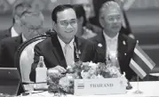  ?? AIJAZ RAHI AP ?? Thailand Prime Minister Prayuth Chan-ocha plays host at a plenary session at the Associatio­n of Southeast Asian Nations (ASEAN) summit in Nonthaburi, Thailand, Saturday. Most leaders of member states attended. U.S. President Donald Trump skipped the gathering.