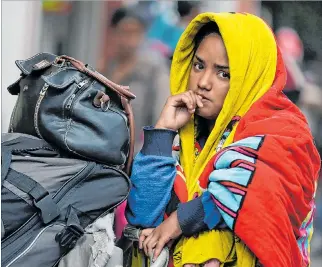  ?? LUISA GONZALEZ / REUTERS ?? Colombia. Una joven que huyó de la violencia y la crisis de Venezuela buscó refugio en el país cafetero.