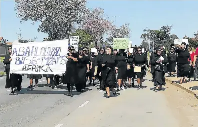  ?? Picture: NONSINDISO QWABE ?? TAKING ON SARS: Emotions run high as widows from far and wide in the Eastern Cape march to the SARS offices in Chiselhurs­t to make their grievances against SARS heard.