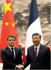  ?? ?? Emmanuel Macron and Xi Jinping: looking beyond the dollar