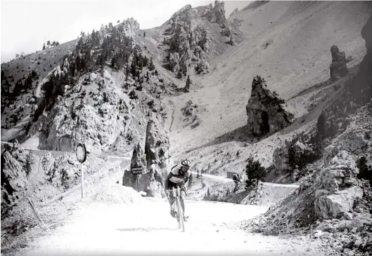  ?? ?? Jean Robic toils up the Col d’izoard on Stage 9 of the 1947 Tour. At this point he lay fifth and seemingly out of contention, but there would be a remarkable twist late in the race