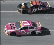  ?? PATRICK SMITH / GETTY IMAGES ?? Denny Hamlin (11) and Austin Dillon (3) made mad dashes to try to stay in the Chase, but Dillon lost out because he could not pass one more car.