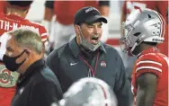  ?? JOSHUA A. BICKEL/COLUMBUS DISPATCH ?? Ryan Day, getting his point across during the Rutgers game on Nov. 7, told his team, “It's just another opportunit­y to work through adversity and learn more about yourselves. That's the only way that I can really put a positive spin on it right now, because nothing about this is good.”