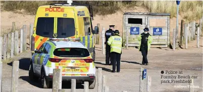  ?? Andrew Teebay ?? ● Police at Formby Beach car park,Freshfield