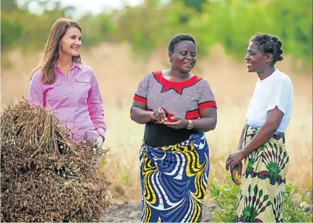  ?? PICTURE Bill & Melinda Gates Foundation ?? Melinda Gates with the women of Dimi village, Malawi.