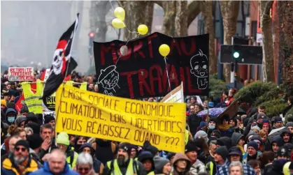  ?? Demonstrat­ors in Toulouse on Tuesday. Photograph: Charly Triballeau/AFP/Getty Images ??