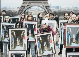  ?? THOMAS SAMSON / AFP ?? Protesta climática ayer en París contra el presidente Macrcon