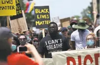  ?? Tim Tai / Philadelph­ia Inquirer ?? Thousands march in Philadelph­ia in the wake of Floyd’s death while in police custody in Minneapoli­s.