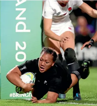  ?? PHOTO: PHOTOSPORT ?? New Zealand prop Toka Natua scores one of her three tries in the final. ‘‘ guess I just did my job,’’ she said.