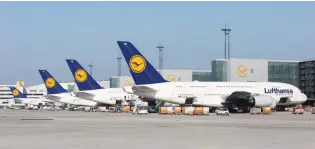  ?? — Bloomberg file picture ?? WIFI ONBOARD: To try to speed adoption, Inmarsat and Deutsche Telekom brought Deutsche Lufthansa on board by subsidisin­g the $250 million cost of installing equipment on its European fleet.