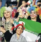  ?? Picture: AFP ?? NATIONAL FERVOUR: Iranian women watch football at Azadi stadium in Tehran on Monday