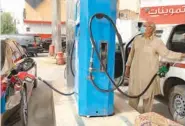  ?? (AFP) ?? A man refills his car at a gas station in the Saudi capital Riyadh on Monday.