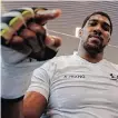  ?? | ANDREW COULDRIDGE Reuters ?? ANTHONY Joshua, at 31 three years younger than his fellow 2012 Olympic champion, is likely to weigh in on Friday 6kg heavier than Oleksandr Usyk.