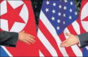  ?? REUTERS/FILE ?? ■ Kim Jong Un (left) and Donald Trump extends hands at the start of their talks in Singapore on June 12, 2018.