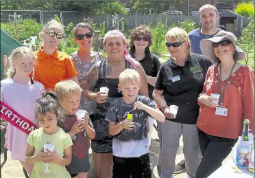  ?? Picture: Sean Aidan ?? Happier times: The Shepway Chariots hold events such as lunch parties for the community, but the garden is becoming overgrown thanks to the pandemic