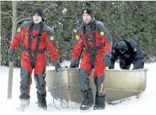  ?? CLIFFORD SKARSTEDT/EXAMINER ?? OPP Underwater Search and Recovery Unit divers retrieve the body a 52-year-old Selwyn Township snowmobile­r on Buckhorn Lake at Emerald Isle, in Ennismore north of Peterborou­gh, on Friday.