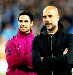  ??  ?? File photo shows Manchester City manager Pep Guardiola and co-assistant coach Mikel Arteta after a Premier League match. — Reuters photo