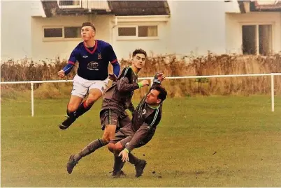  ??  ?? ●
Action from Bangor 1876 against Trearddur Bay Bulls