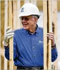  ?? MARK HUMPHREY/AP 2015 ?? Former U.S. President Jimmy Carter works at a Habitat for Humanity building site in Memphis, Tennessee, in 2015.