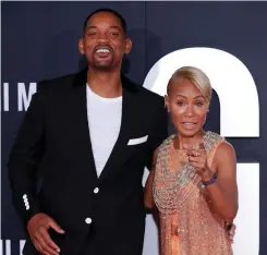  ?? | Reuters ?? WILL Smith and Jada Pinkett Smith, whose history with Tupac galled Will.