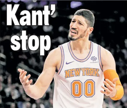  ?? Paul J. Bereswill ?? WITH HONOR: Knicks center Enes Kanter, who is battling back and wrist injuries, feels it is his duty to his teammates and the franchise to try to play the remaining four games of the season.