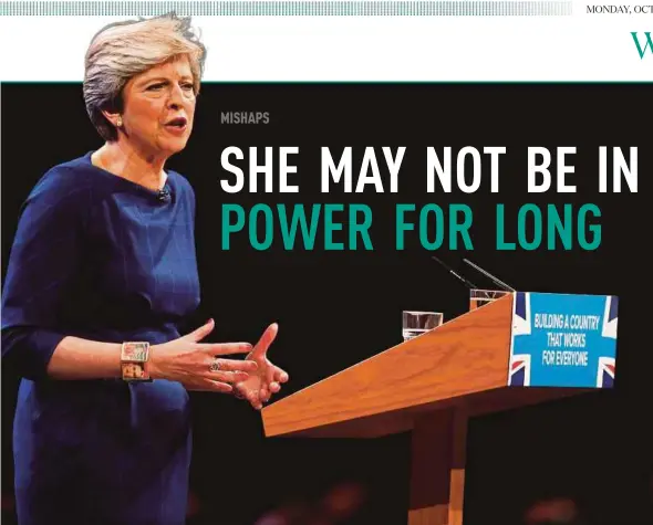  ?? REUTERS PIC ?? British Prime Minister Theresa May addressing the Conservati­ve Party at a conference in Manchester, the United Kingdom, on Wednesday.