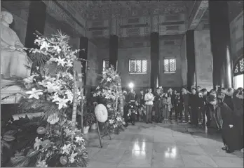  ?? JI CHUNPENG / XINHUA ?? Kuomintang Chairwoman Hung Hsiu-chu bows before a statue of KMT founder Sun Yat-sen at the memorial hall of the Sun Yat-sen Mausoleum in Nanjing on Monday.